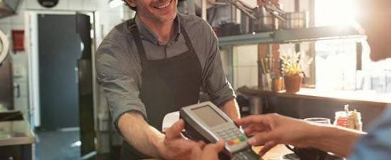 credit card machine taking payment